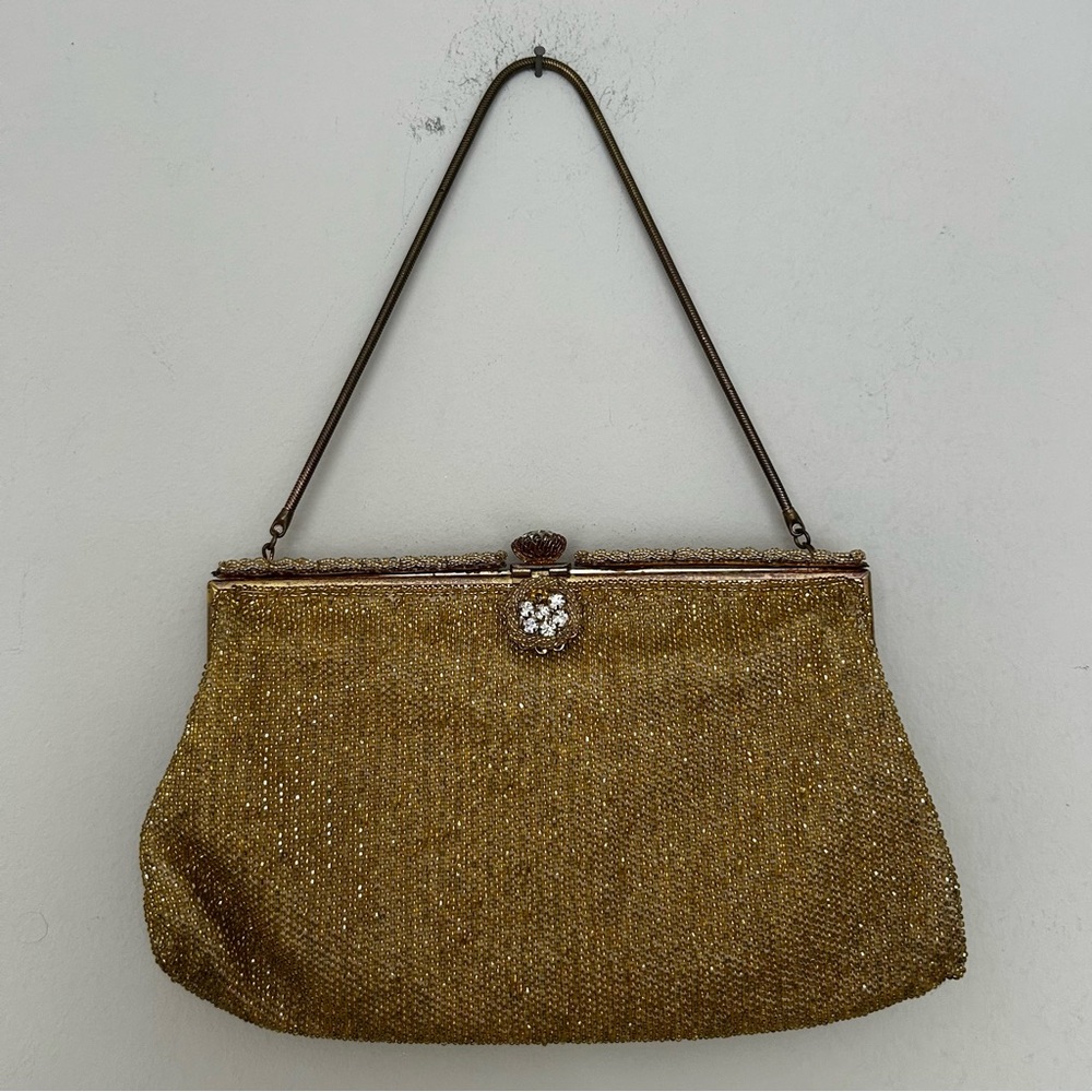 Vintage gold beaded evening clutch with a rhinestone clasp. Made in France.